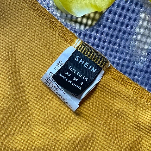 Spectacular bodysuit with circular designs on the front and semi-open back - Picture 5 of 5